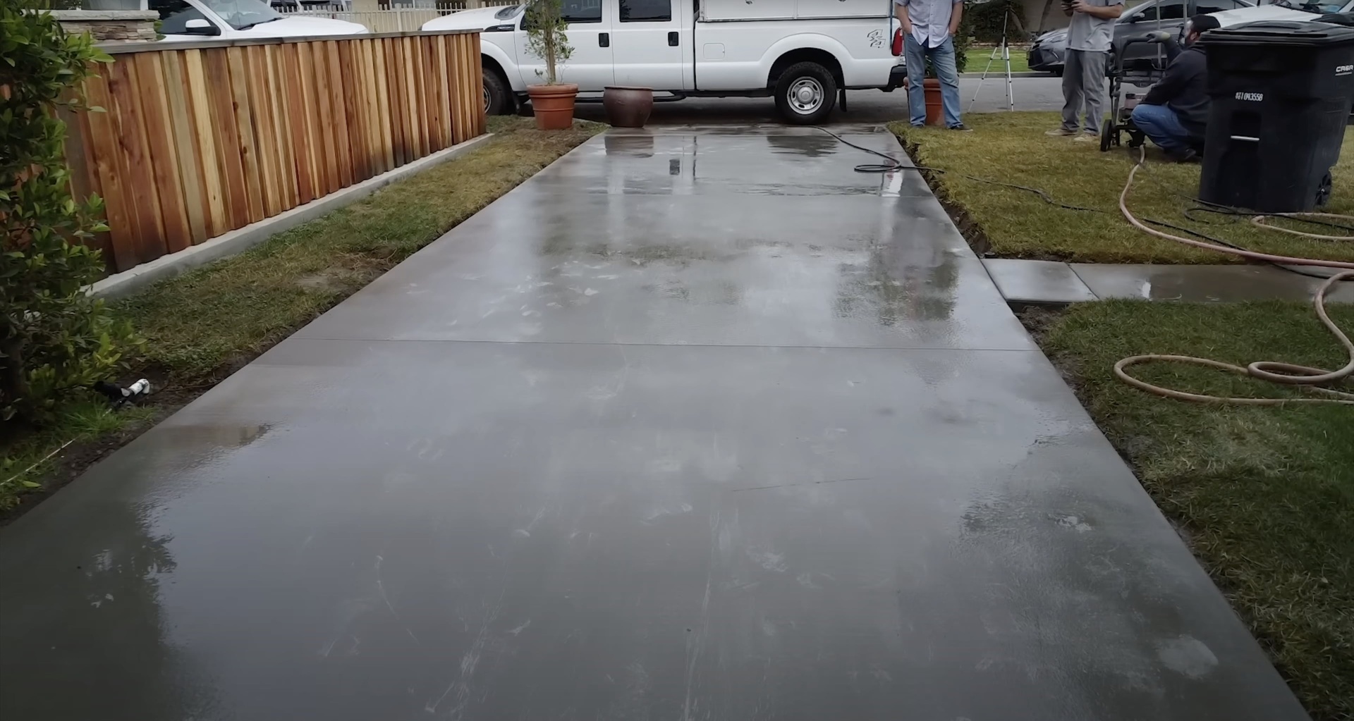 High-quality concrete driveway installation for residential property Residential concrete driveway with professional finishing in progress