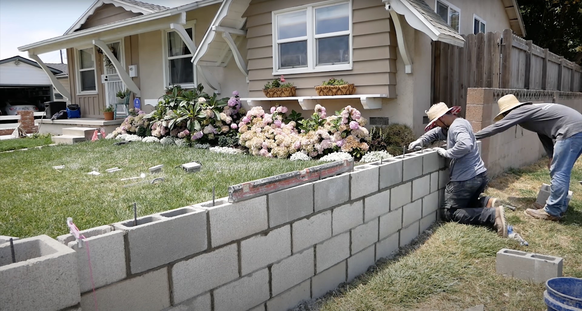 Expert concrete masonry and block installation services Concrete masonry work with professional crew installing concrete blocks